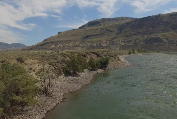 A view of a river and rolling hills